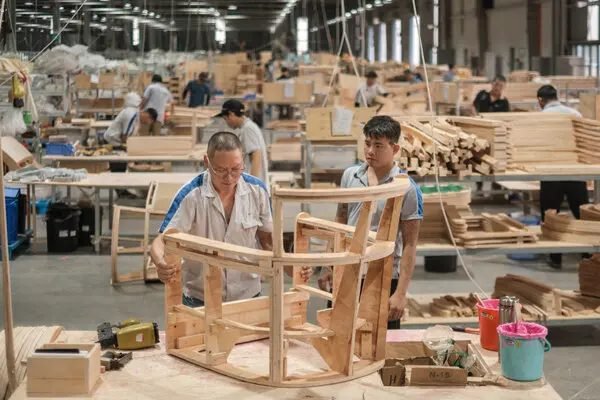 Woodworking at a furniture factory in China